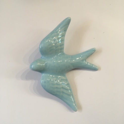 Hirondelle en céramique bleu
